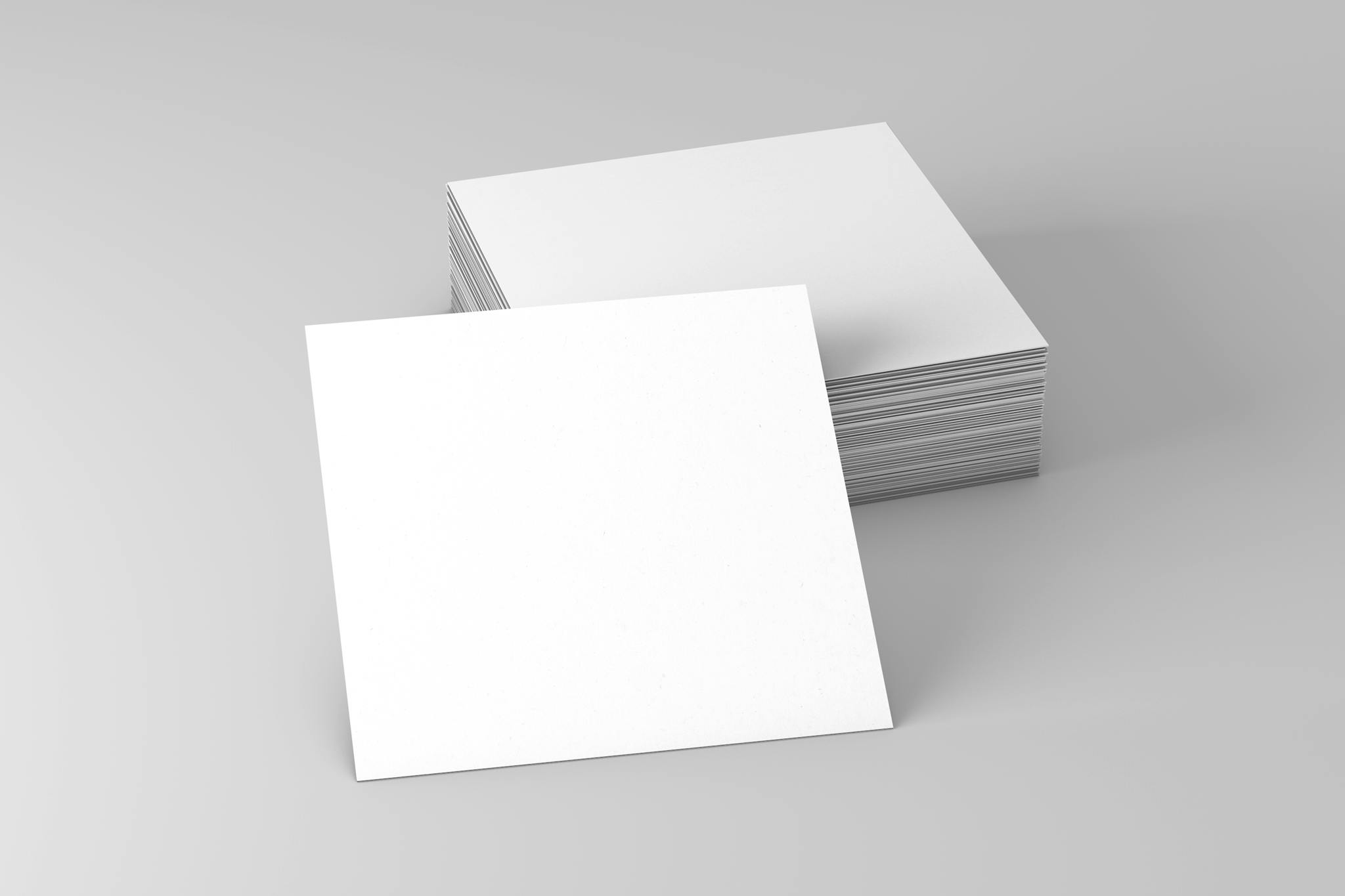 A stack of blank white square cards perfect for design mockups and presentations.